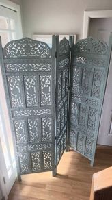 Carved wooden room divider