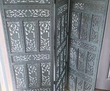 Carved wooden room divider