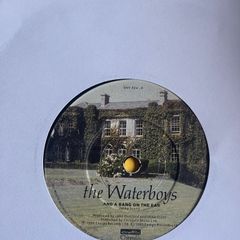 The waterboys. And a bang on the ear vinyl record