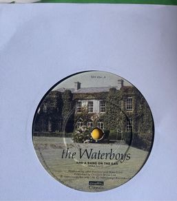 The waterboys. And a bang on the ear vinyl record