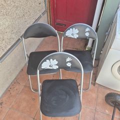 3 Folding padded chairs