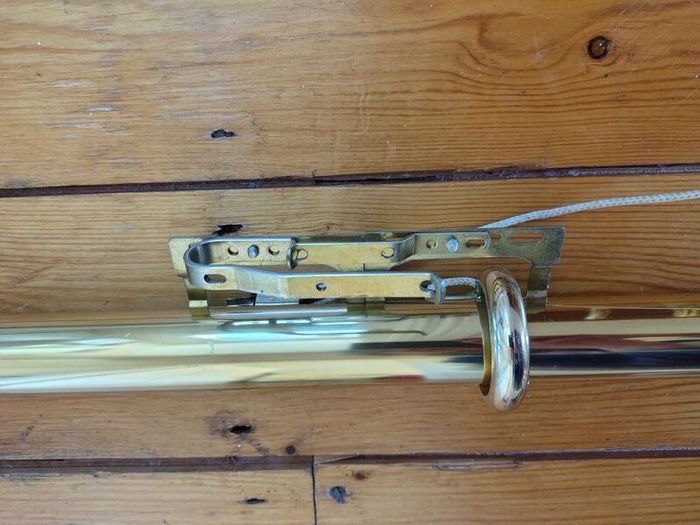 Brass coloured curtain track