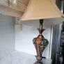 Vintage Tuscan style table lamp with gold-finish resin body with intricate scrollwork and reddish-orange mosaic crackle accents Image 2