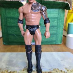 The Rock wrestling action figure trunks loose