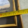 VINTAGE Framed landscape print featuring an oval matte aperture with a golden sunset or sunrise over a river, bare trees, and two birds flying in the sky. Image 4