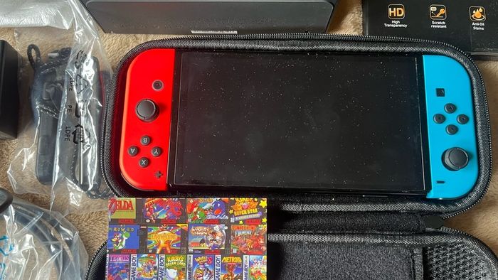 Nintendo Switch OLED, Used Twice + New Case + 4 Screen Protectors