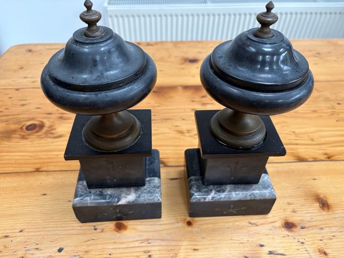 Matching pair of antique marble, slate and brass ornaments.