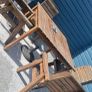 Solid wooden table and chairs. Good quality wood with nice and wide chairs for comfort. One lat missing on one chair Image 4