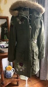 Green parka coat
