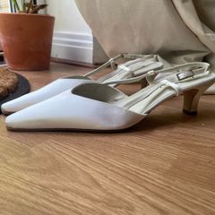 Ivory kitten heels