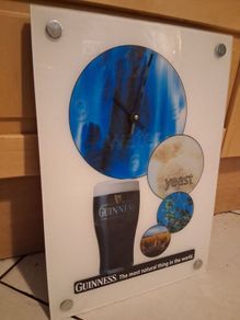 Large Guinness advertising wall clock