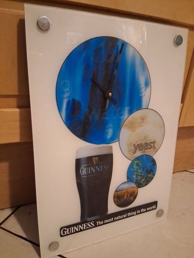 Large Guinness advertising wall clock