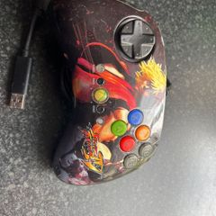 Xbox 360 Capcom Street Fighter 4 control pad.