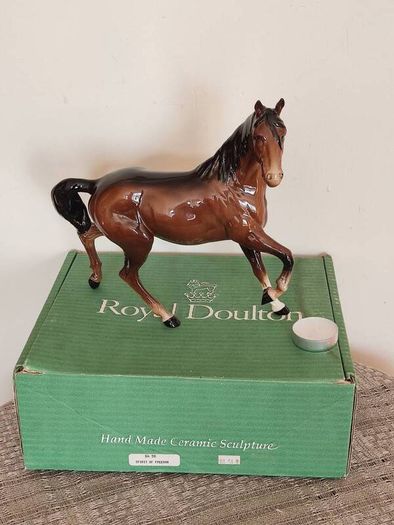 Vintage Royal Doultot porcelain horse. new in the box.