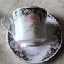 Set of Vintage Floral Porcelain Tea Cups and Saucers Image 2