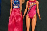 Two Barbie Dolls.