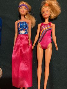 Two Barbie Dolls.