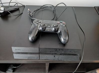 PS4 with PS4 & PS3 Games