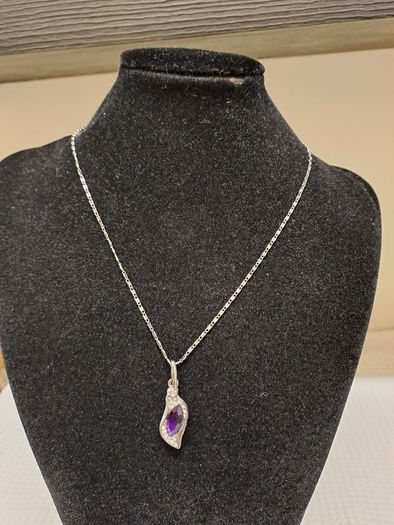 Silver Tone Necklace with Purple Crystal Pendant