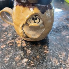 Pretty ugly pottery mug