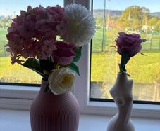 Stylish decorative vases with faux flowers