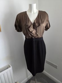 Like new. Size 14 Coast dress with black pencil skirt and olive-green silk frilled top.