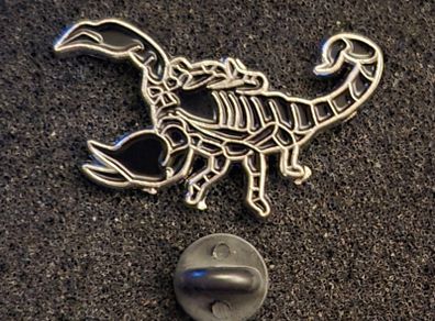 Scorpion , pin back badge.
