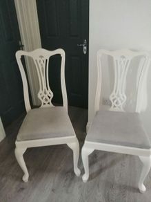 Two oak chairs linen seat covers