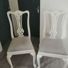 Two oak chairs linen seat covers