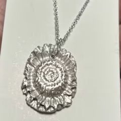 Handmade solid fine silver flower pendant on an 18 inch necklace