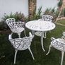 Ornate cast iron garden table and 4chairs Image 2