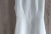 Elegant solid dress padded shoulders size fits Xs s worn once for an hour