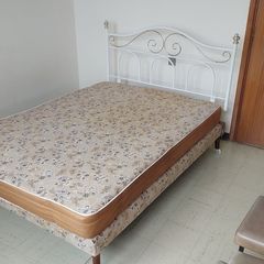 metal double bed and mattress