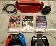 Nintendo Switch Console OLED, Mario Red with Controllers + Games
