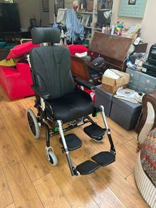 Tilt in space wheelchair
