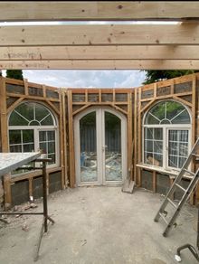 Arched patio door and 3 arched windows
