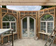 Arched patio door and 3 arched windows