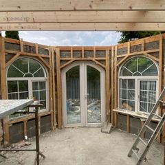 Arched patio door and 3 arched windows