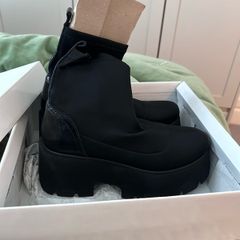 Fab black ankle boots still in box, worn once.  Stretch fabric and block heel.