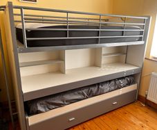 Bunk bed with pull-out desk