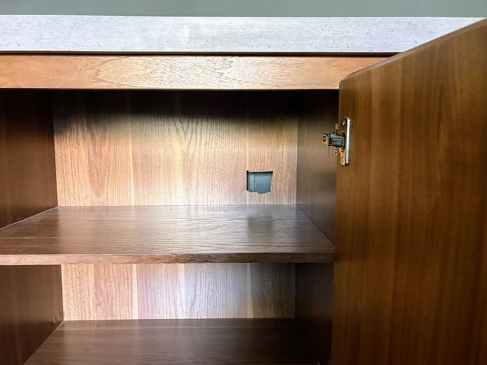 Modern walnut sideboard with stone top