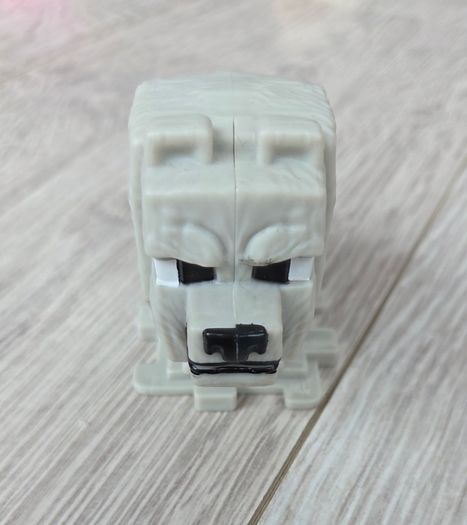 Dennis the Wolf from the Minecraft movie figure.