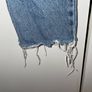 Distressed blue jeans Image 5