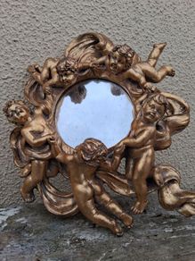 baroque cherub mirror