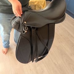 general saddle used for breaking in with shore leathers included