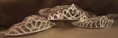 rhinestone tiara , possibly holy communion