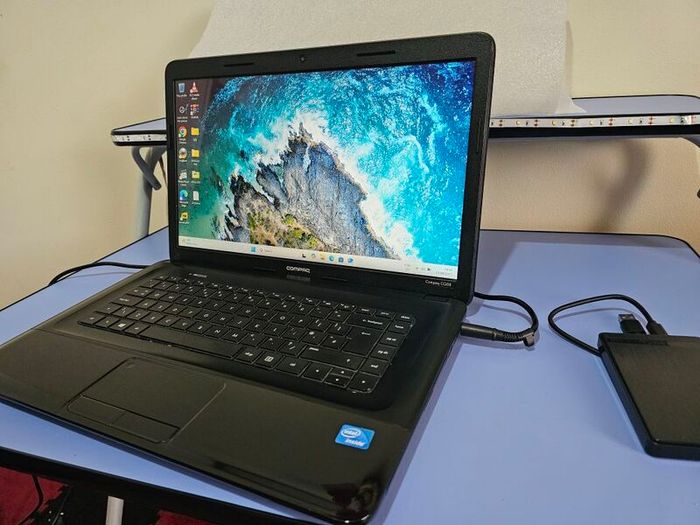 HP Compaq CQ58 Laptop Intel Celeron, 8GB RAM, Samsung 128GB SSD + Extra Storage Toshiba 750GB External USB HDD.