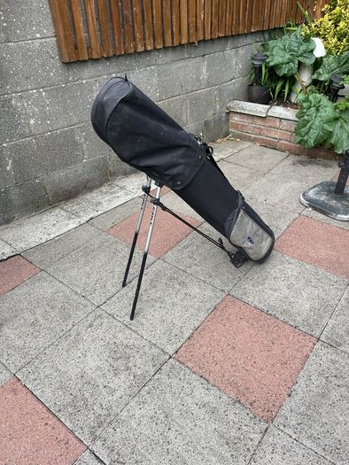 Left hand golf clubs and stand