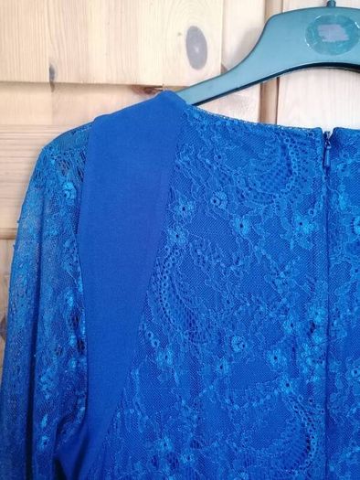 dress coast size 16 lined lace. Nice stretch  material Has small hoops for a belt lovely dress