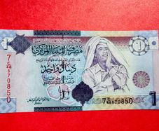 Libya. 1 Dinar  2009  Pick  71.  Gaddafi  Uncirculated